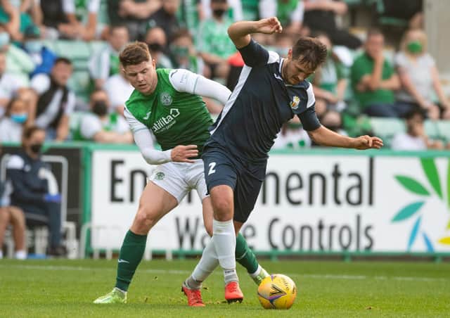 Kevin Nisbet battles Robert Ramos for possession during the first leg at Easter Road, which Hibs won 3-0. Picture: SNS