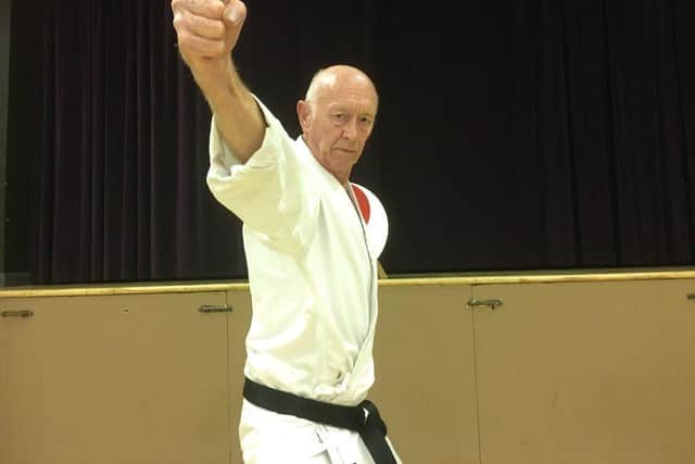 Mike Mitchell has become a 1st dan black belt at the age of 74