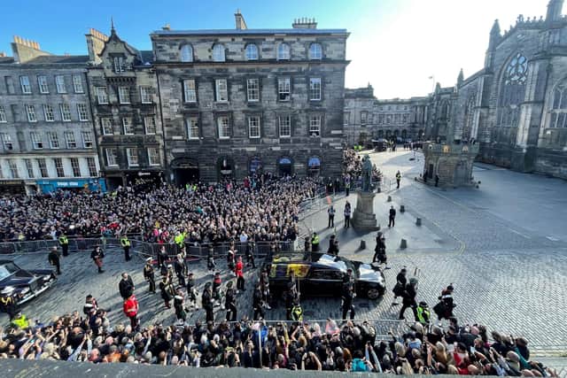The hearse with the Queen's coffin leaves St Giles Cathedral.