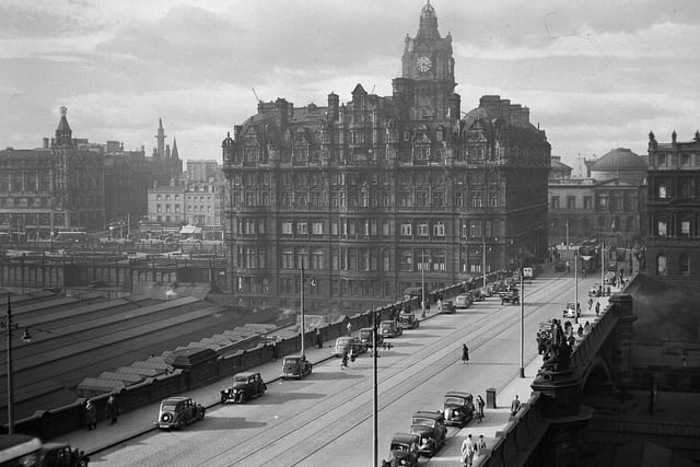 View of the  North British Hotel with North Bridge in the foreground with tramlines.
