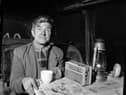 John McDonald, the nightwatchman at Leith Fort Flats, April 1960.