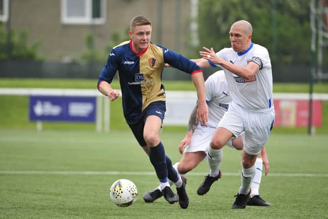 Captain Michael Gemmell looks to chase down possession in midfield (Pictures: Alan Murray)