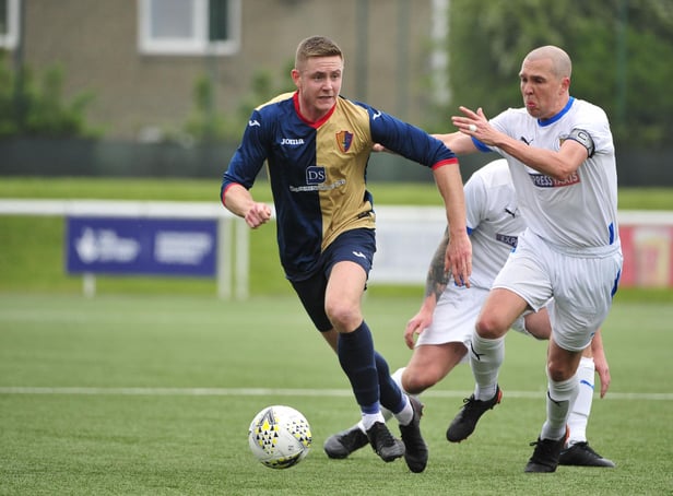Captain Michael Gemmell looks to chase down possession in midfield (Pictures: Alan Murray)