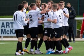 Danny Handling (centre) celebrates with his team mates after scoring for Edinburgh City in the play-off win over Elgin. (Photo by Ross Parker / SNS Group)