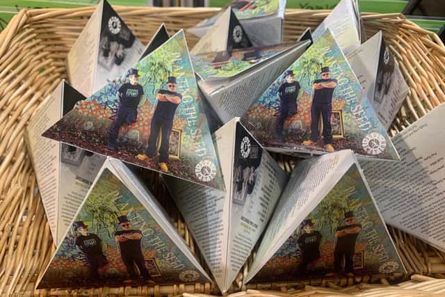 I-Soul-Nation's cardboard pyramids, with rubber top hat and USB stick inside