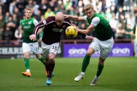 Hearts striker Liam Boyce and Hibs defender Josh Doig in action during the last league Edinburgh derby of the 2021/22 season at Tynecastle. Picture: SNS