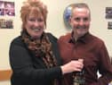 Christine Grahame MSP presenting Pud with a bottle of Scottish Parliament Whisky at his farewell party at the Ladywood Centre.