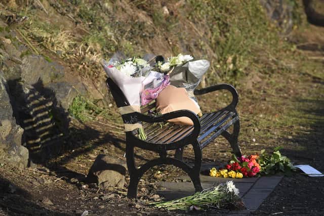 Floral tributes were left on the bench after the tragedy.