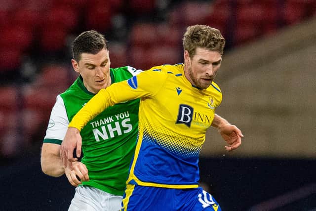 Paul Hanlon of Hibs vies for the ball with St Johnstone's David Wotherspoon during the last meeting between the two team