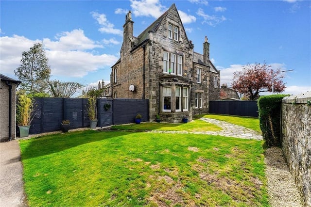 It may not be in Edinburgh, but this spacious five-bedroom home looks like a lovely place to live. The Victorian property, located in Kirkcaldy, has many desirable period features, including coving and fireplaces, as well as a beautiful walled garden, a private driveway and a garage.The semi-detached house is going for offers over £460,000.