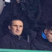 Johnny Kenny, right, pictured in the Easter Road directors' box against Dundee