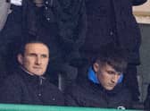 Johnny Kenny, right, pictured in the Easter Road directors' box against Dundee