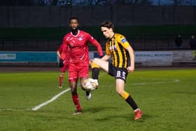 Civil Service Strollers forward Alieau Faye, who put his team in front, closes down Berwick midfielder Aidan Denholm, who is on loan from Hearts. Picture: Alan Bell/BRFC