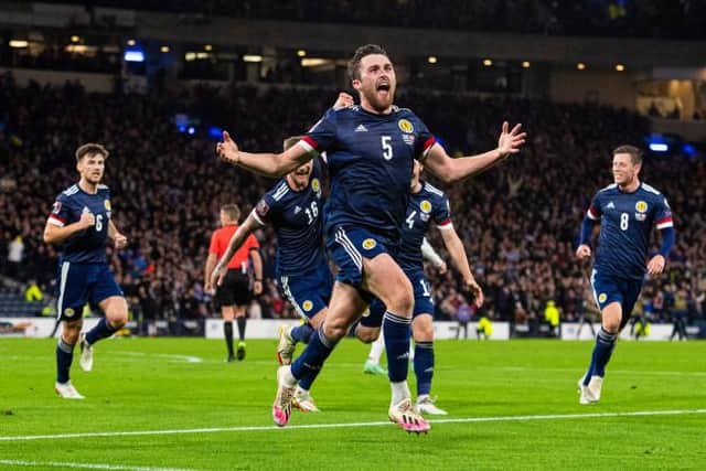 John Souttar celebrates after giving Scotland the lead in their World Cup qualifier against Denmark at Hampden. (Photo by Ross MacDonald / SNS Group)