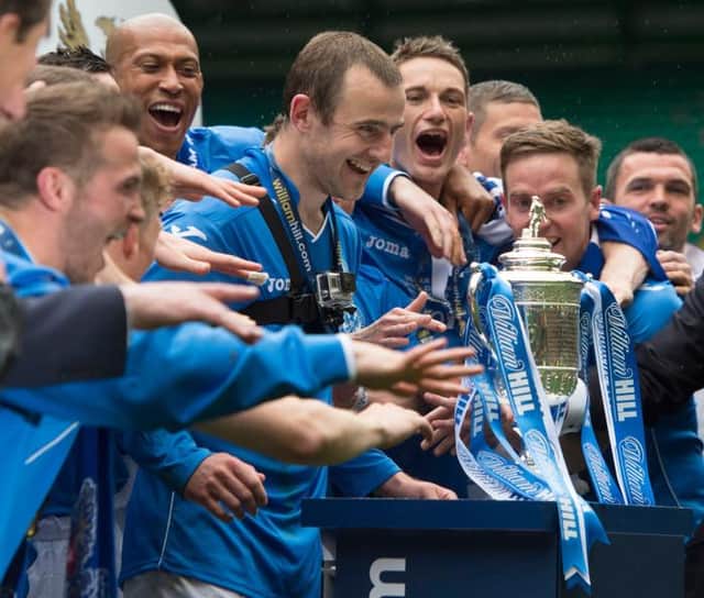 The St Johnstone players celebrate with the Scottish Cup in 2014. Picture: SNS