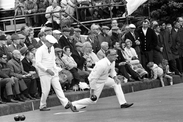 Scotland bowls team member Bob Motroni and England's David Bryant on the green during the Commonwealth Games at Balgreen bowling club, Edinburgh, in July 1970.