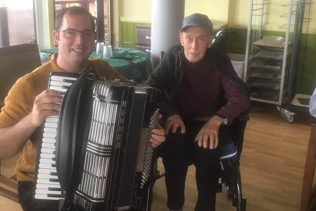 Ewan Galloway visiting his friend Peter Aitchison, to play for him and all the residents of the Lammermuir House care home in Dunbar.