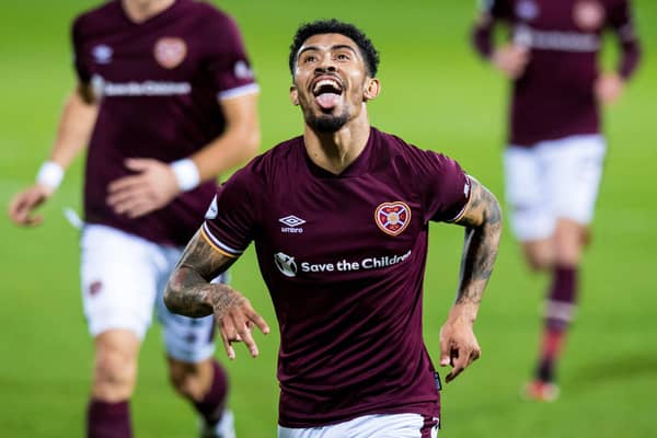 Josh Ginnelly celebrates his first goal for Hearts.