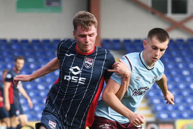 Ben Woodburn in action for Hearts against Ross County. (Photo by Craig Foy / SNS Group)