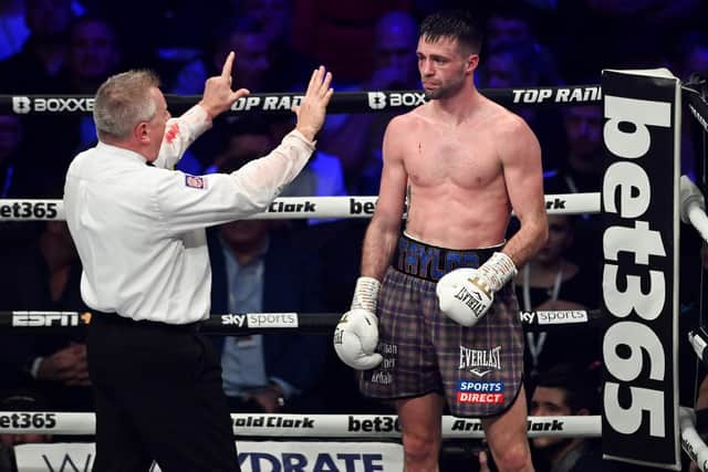 Josh Taylor on the count after being knocked down by Jack Catterall in round eight