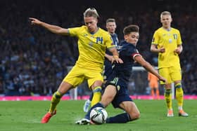 Aaron Hickey challenges Ukraine's Mykhailo Mudryk during the World Cup play-off semi-final defeat at Hampden. It was his first start for Scotland. Picture: Craig Foy / SNS