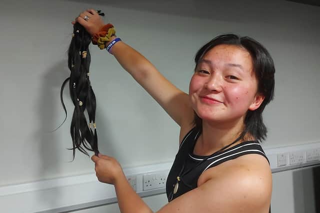 Abigail Charlton after she cut her hair off at local charity event
