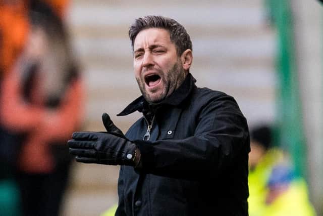 Lee Johnson issues instructions from the touchline during the 2-2 draw with Dundee United