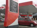 The price of petrol displayed at a fraction of a penny over £1/litre at Moran's filling station in Ballykelly, County Londonderry, as the effects of the economic slowdown caused by the coronavirus weighs down global oil prices.