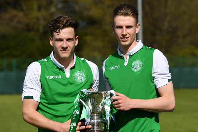 Jamie Gullan and Oli Shaw with the Development League trophy in 2018. Picture: SNS