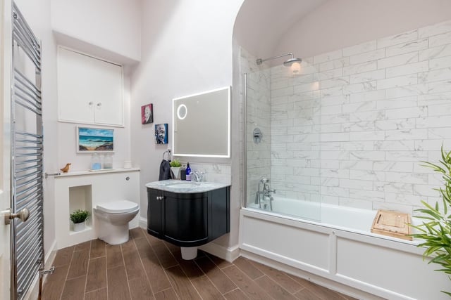 The property also includes this attractive modern bathroom.