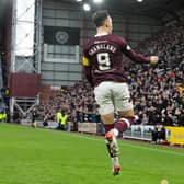 Hearts' Lawrence Shankland celebrates after making it 2-0 against Hibs.