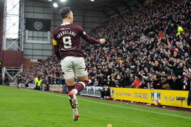 Hearts' Lawrence Shankland celebrates after making it 2-0 against Hibs.
