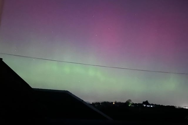 Pink, purple and green hues shone in the skies above Linlithgow in West Lothian.