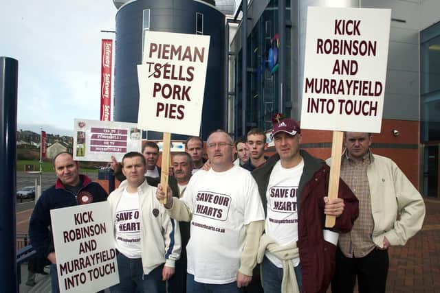 Hearts fans gather outside an SPL board meeting in March 2004 to protest over the club's proposed move to Murrayfield