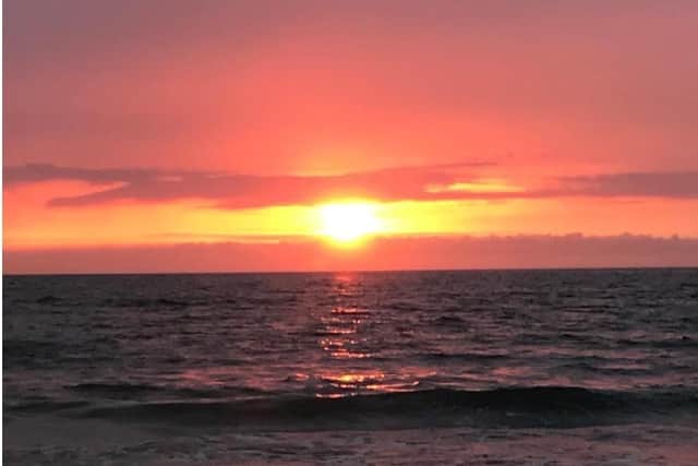 This picture of the dawn awakening was taken by reader Elaine Lannie  before the summer solstice one year at Portobello Beach