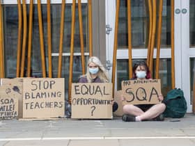 Pupils protesting outside the Scottish Parliament over exams    Picture: Lisa Ferguson





COVID 19  - A COUPLE OF STUDENTS PROTEST OUTSIDE THE SCOTTISH PARLIAMENT THIS AFTERNONN WITH REGARDS TO EXAMS