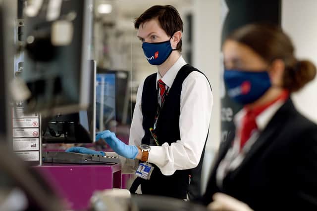 Perspex screens have been installed at check-in desks, while staff must wear face maskes