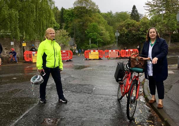 Councillors Melanie Main and Lesley Macinnes at the Braid Road road closure, designed to aid social distancing and active channel