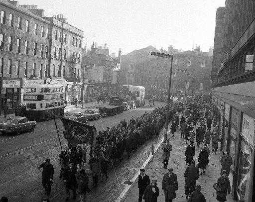 The ship building and engineering unions one day token strike, with demonstrators marching along Lothian Road. 7 February 1962