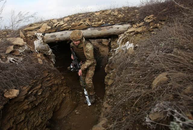 Trench warfare has returned to Europe following Vladimir Putin's invasion of Ukraine (Picture: Anatolii Stephanov/AFP via Getty Images)