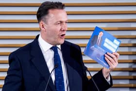Scottish Conservative leader Russell Findlay with his party’s manifesto.