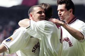 Colin Cameron celebrates with his Hearts team-mates after tucking away his penalty in the 1998 Scottish Cup final. Picture: SNS