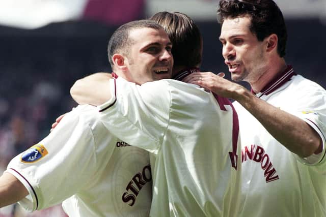 Colin Cameron celebrates with his Hearts team-mates after tucking away his penalty in the 1998 Scottish Cup final. Picture: SNS