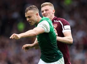 Hearts' Taylor Moore shoves Hibs' Ryan Porteous during the Scottish Cup semi-final.
