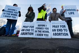 Campaigners who are against abortion protest outside Glasgow's Queen Elizabeth Hospital. They will be demonstrating at the hospital for the whole of Lent (Photo: John Devlin).