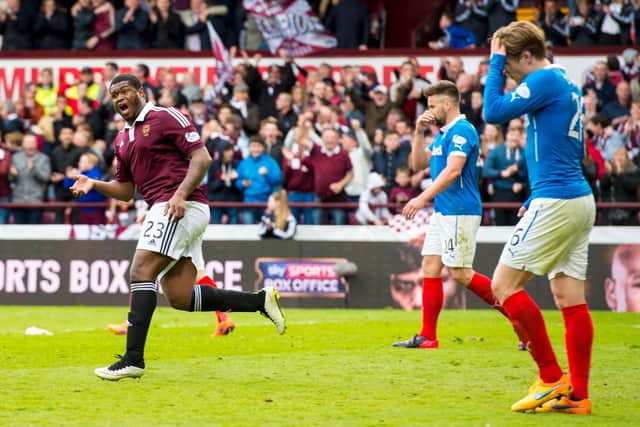 Hearts' Genero Zeefuik (left) celebrates after scoring his side's first goal of the game against Rangers.