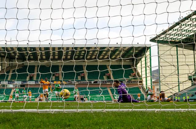 Jordan Roberts scores to make it 1-0 to Motherwell during the Scottish Premiership match win over Hibs at Easter Road on Saturday. (Photo by Mark Scates / SNS Group)