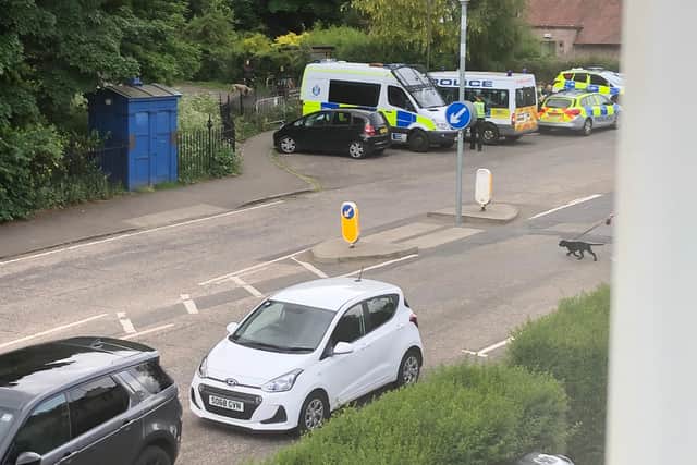 A large police presence appeared at Cluny Gardens on Tuesday morning