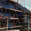 Homes under construction. Photo (stock image)