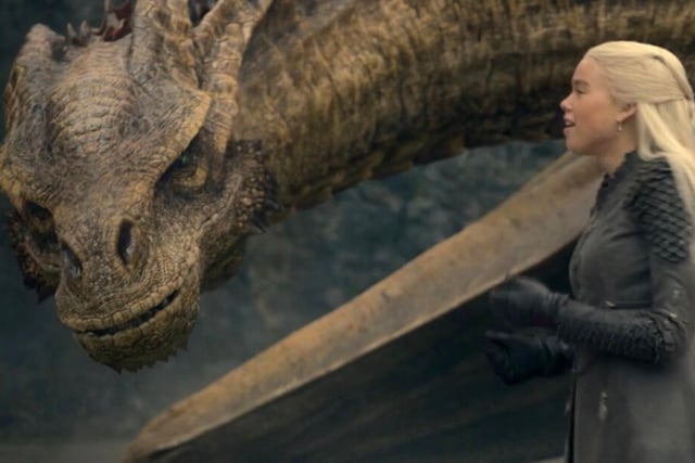 Syrax the she-dragon is ridden by Princess Rhaenyra Targaryen (Emma D'Arcy / Milly Alcock), who is named heir to the throne by her father King Viserys (Paddy Considine). Syrax has yellow scales and is huge and formidable, but not as battle-hardened as Caraxes.